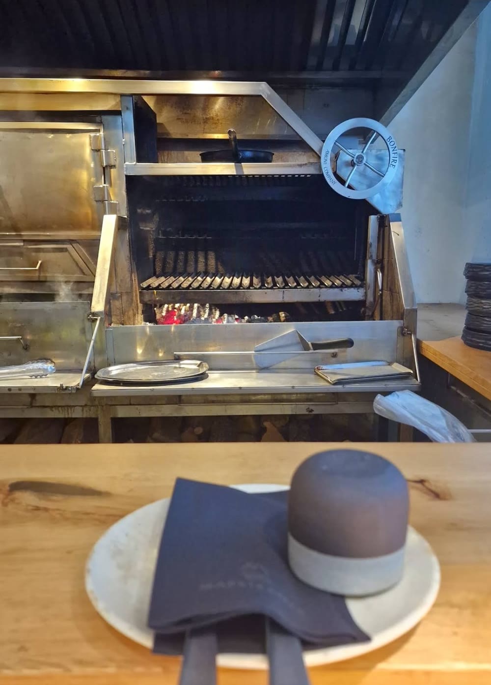 Skewers grilling over open wood fire